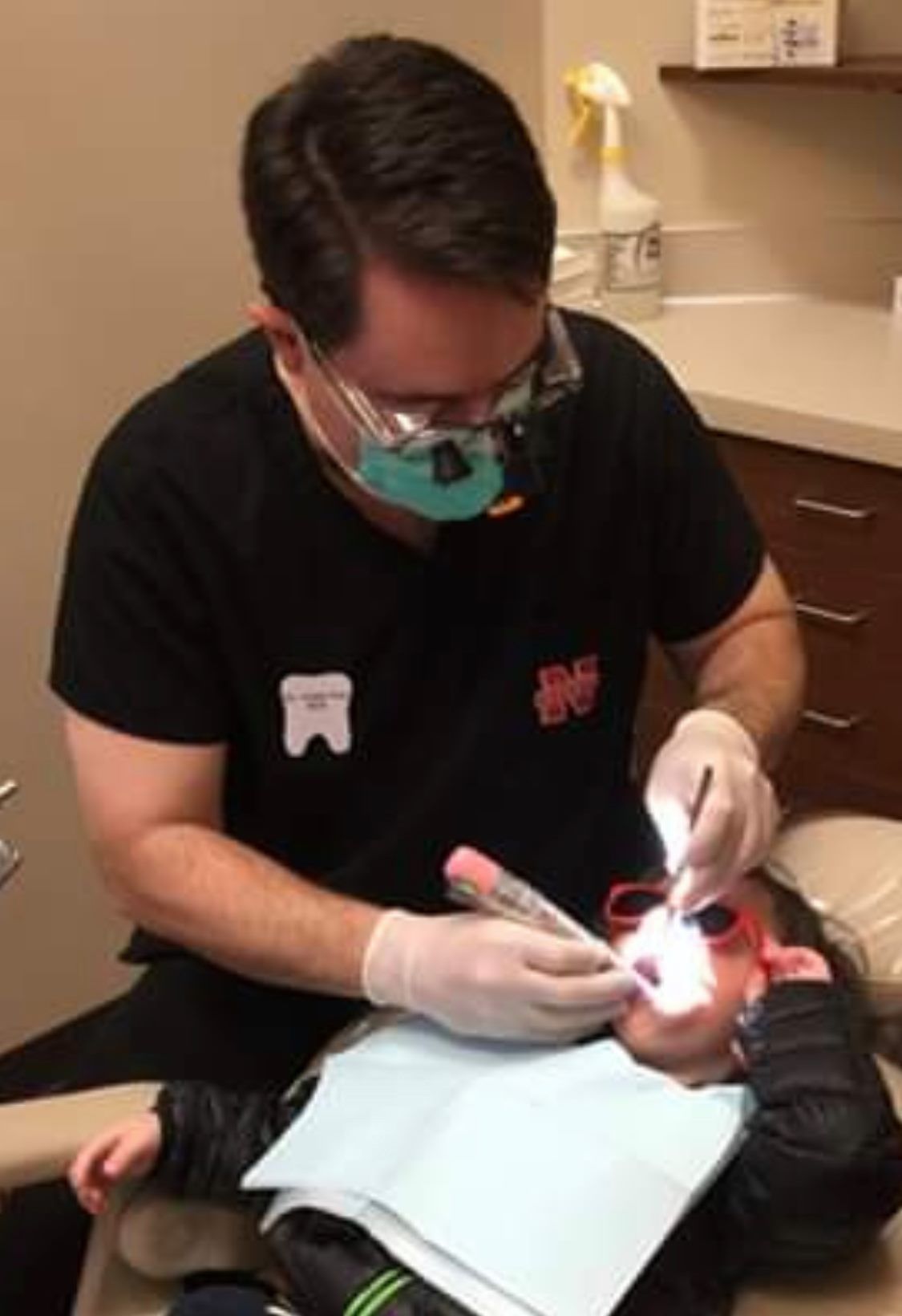 Dentist with a child patient