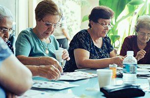 Learn More About Activities Senior playing bingo