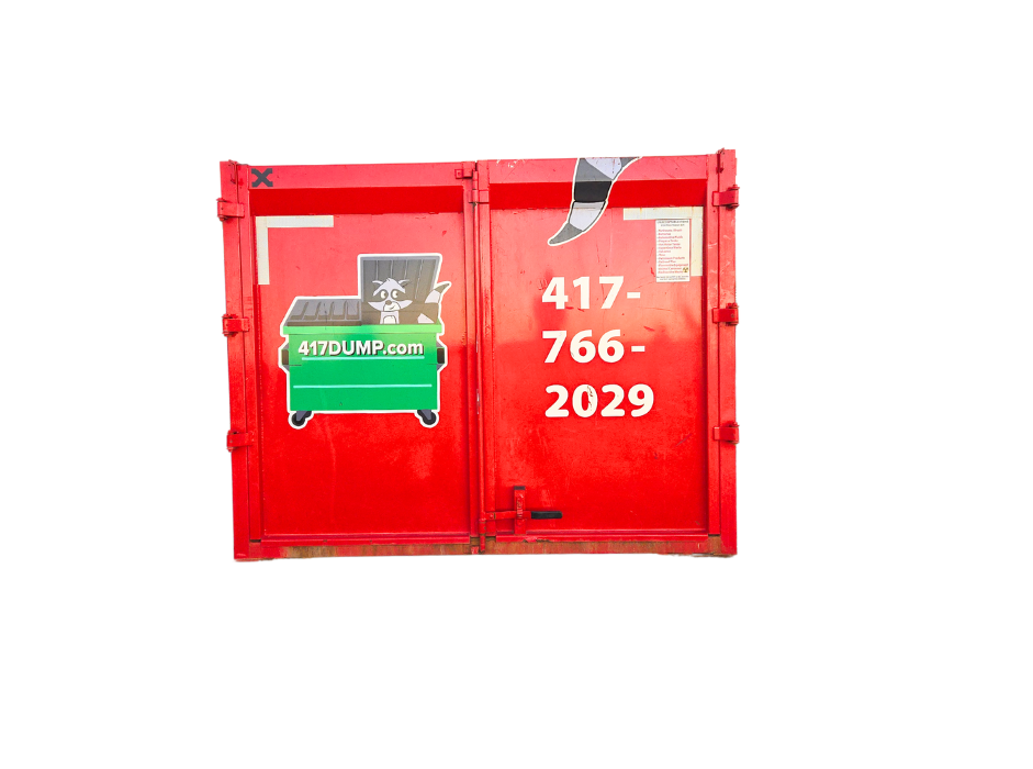 A red dumpster with a green dumpster on it.