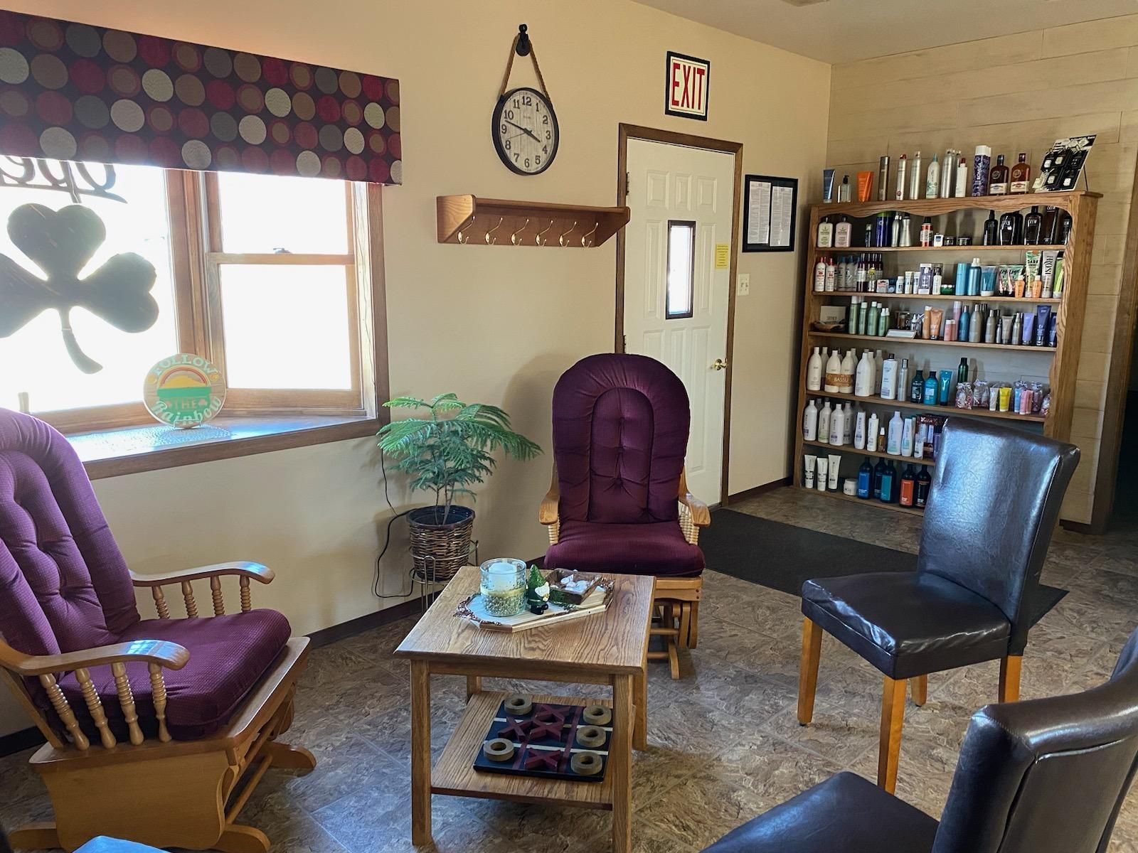 Salon interior with purple chairs and products shelves
