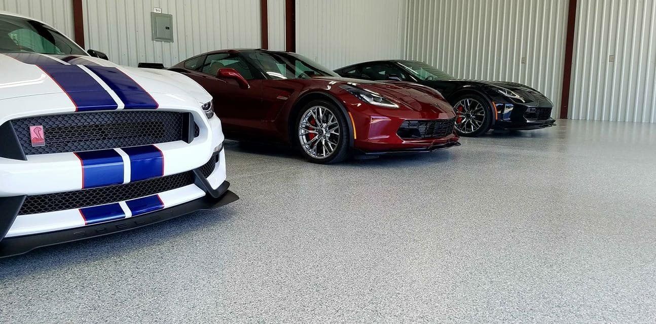 Sport cars in a coated garage flooring