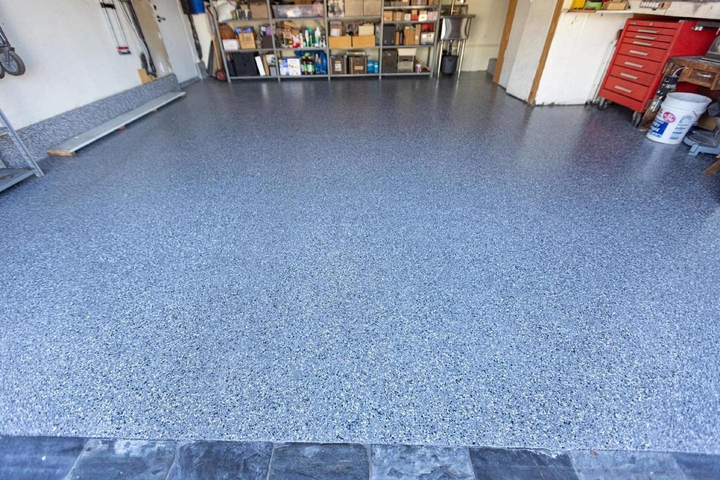 Coated garage flooring