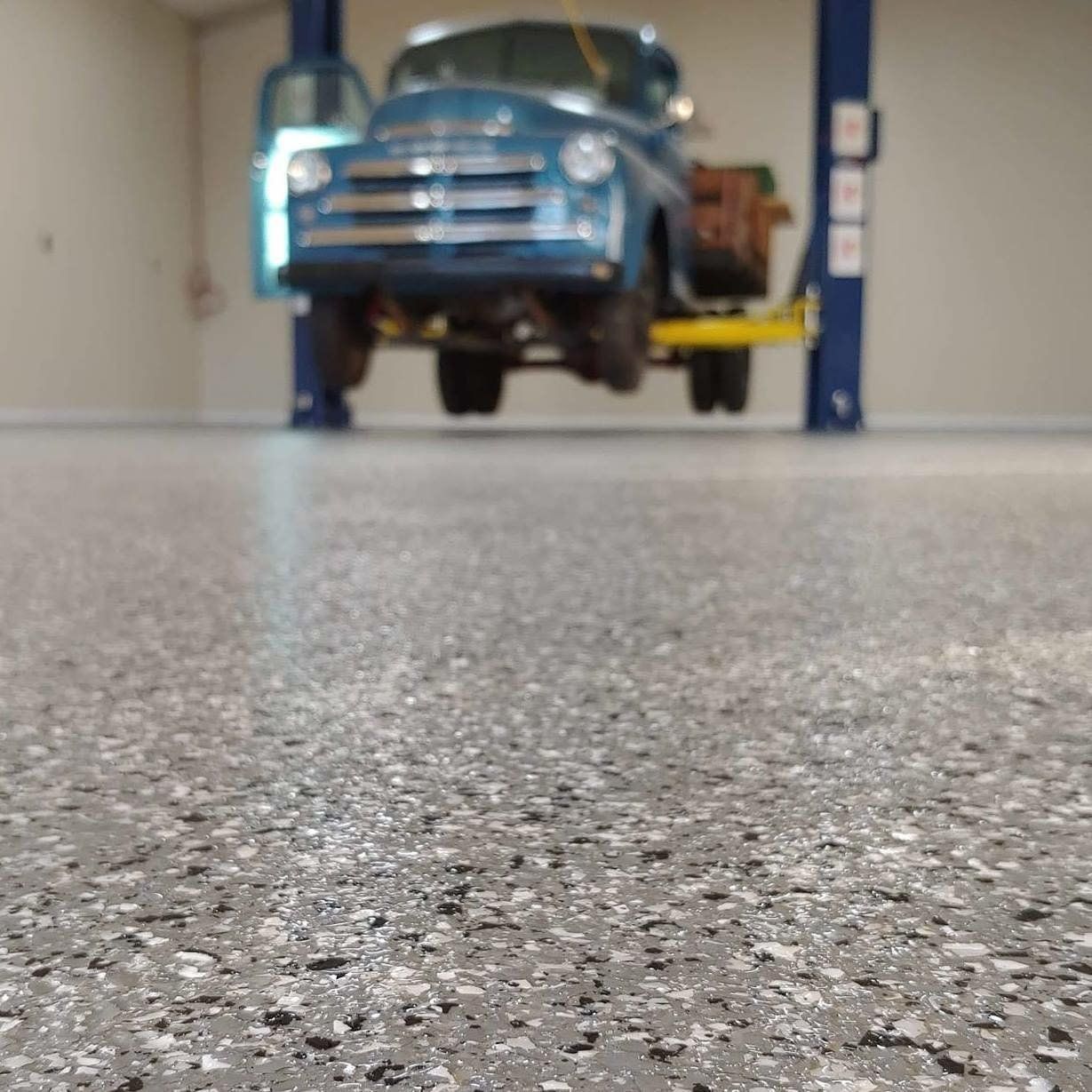 Coated garage flooring