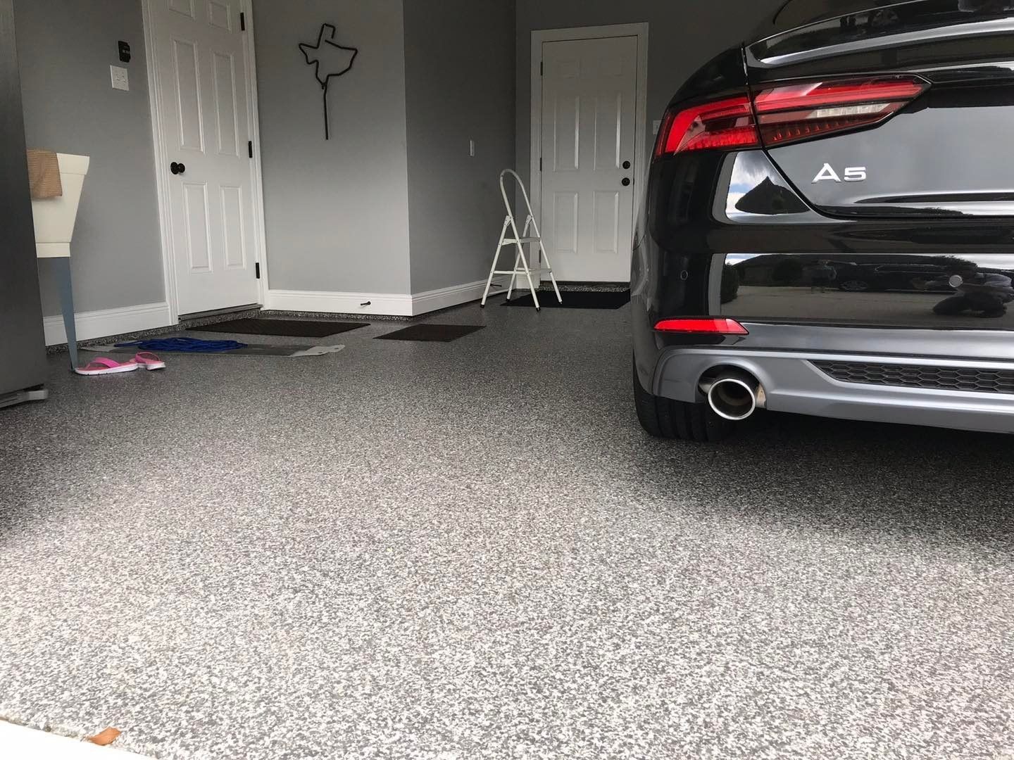 Black car inside a carport