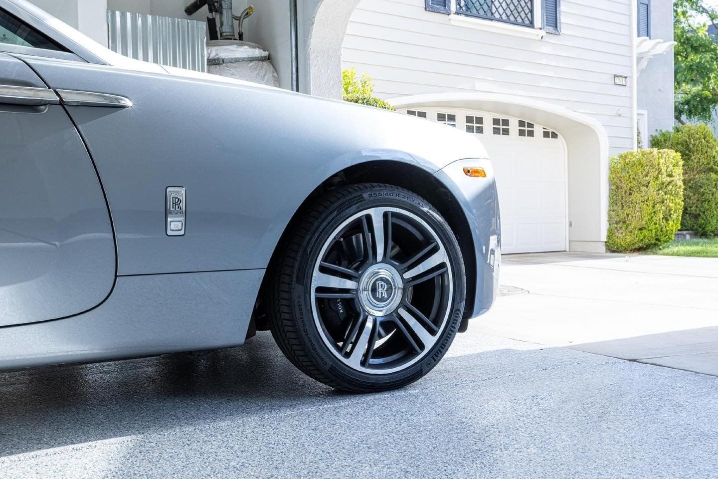 Gray car inside a garage