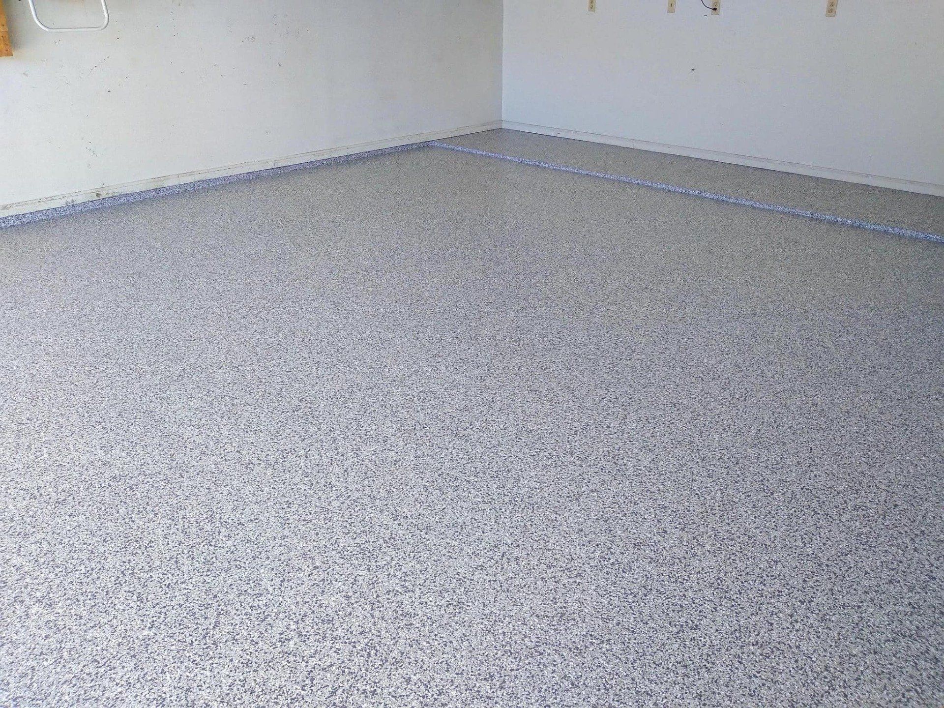 Coated concrete garage