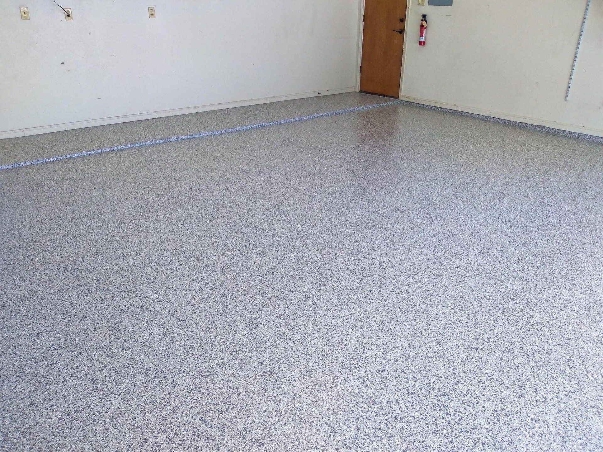 Coated concrete garage floor