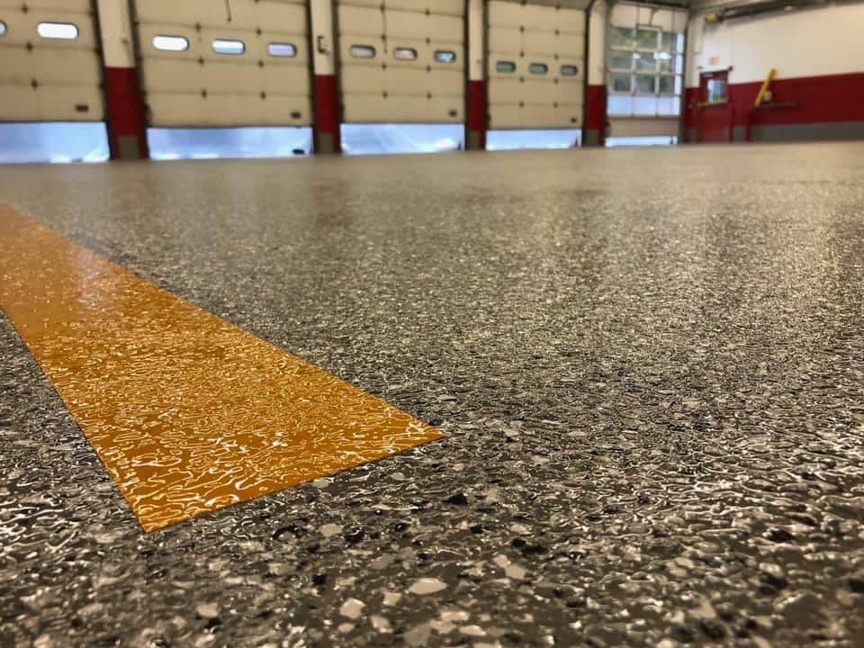 Coated garage flooring