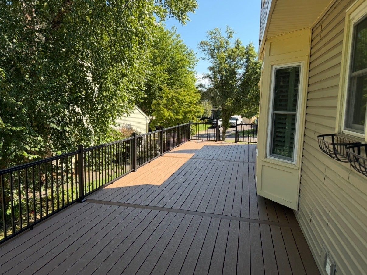 A newly built deck with the house on the right