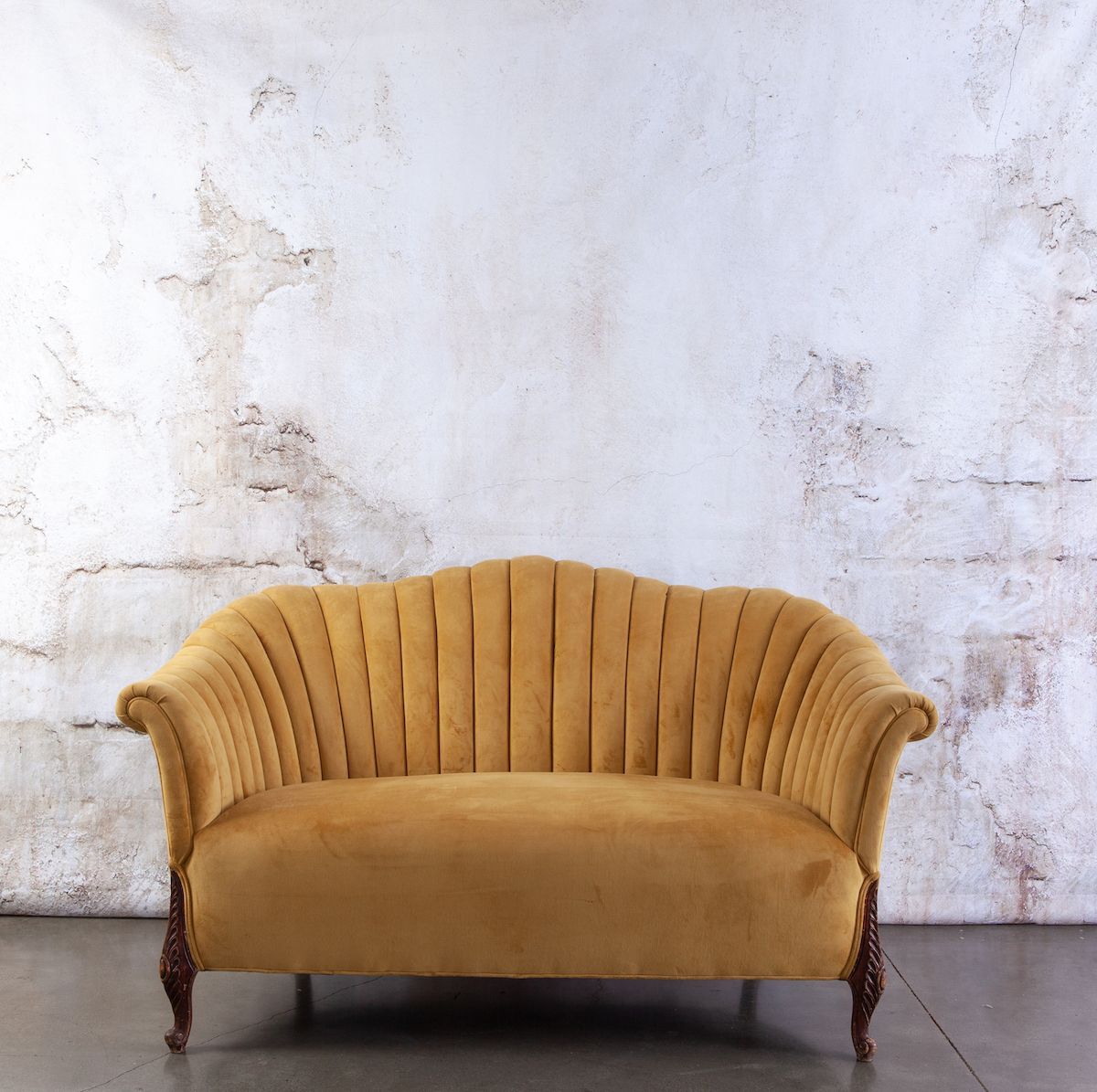 Mustard-colored love seat
