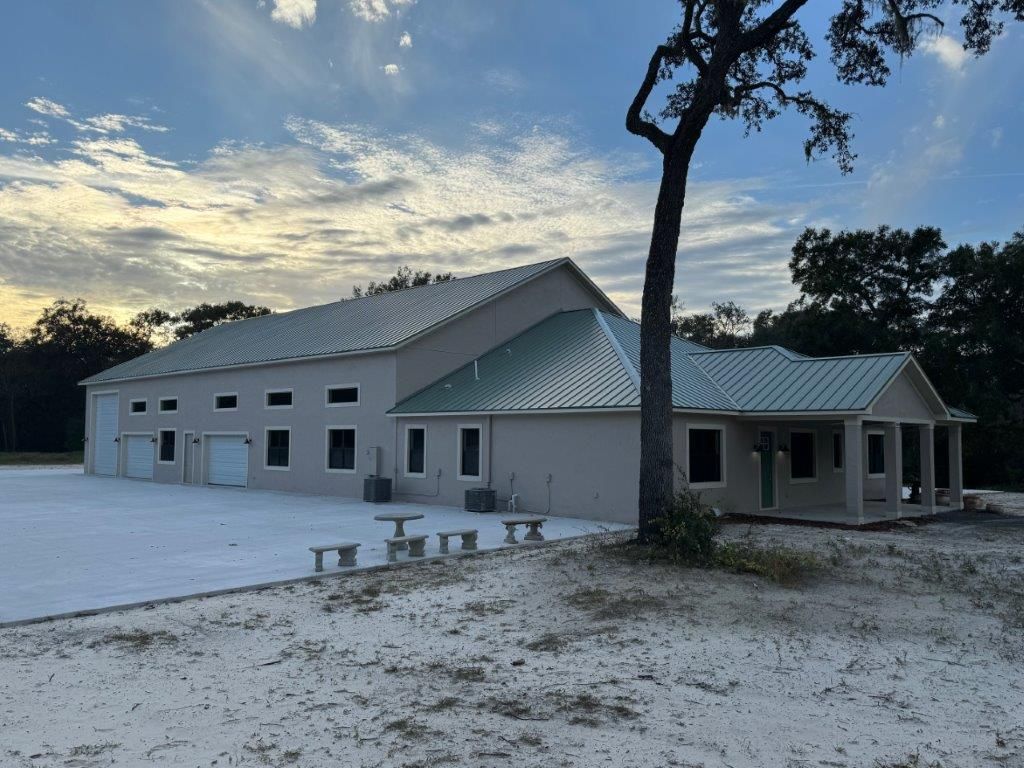 A large building with a tree in front of it