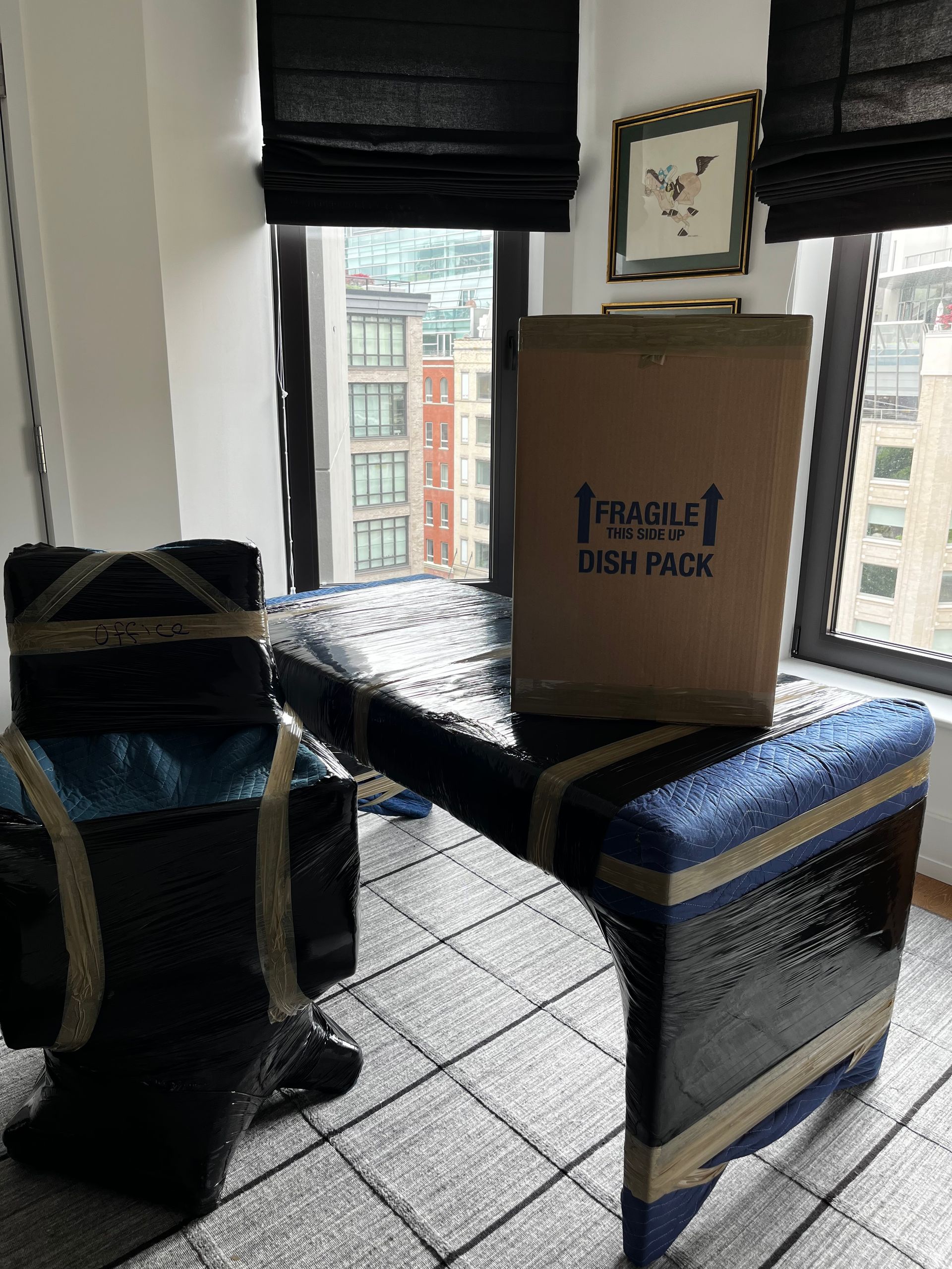 A cardboard box is sitting on top of a table in a room.
