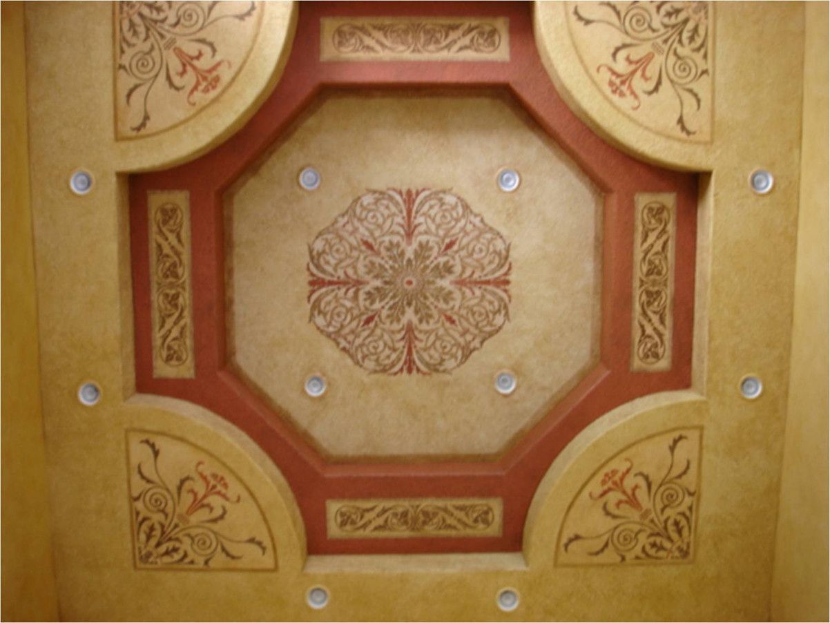 A ceiling with a circular design on it