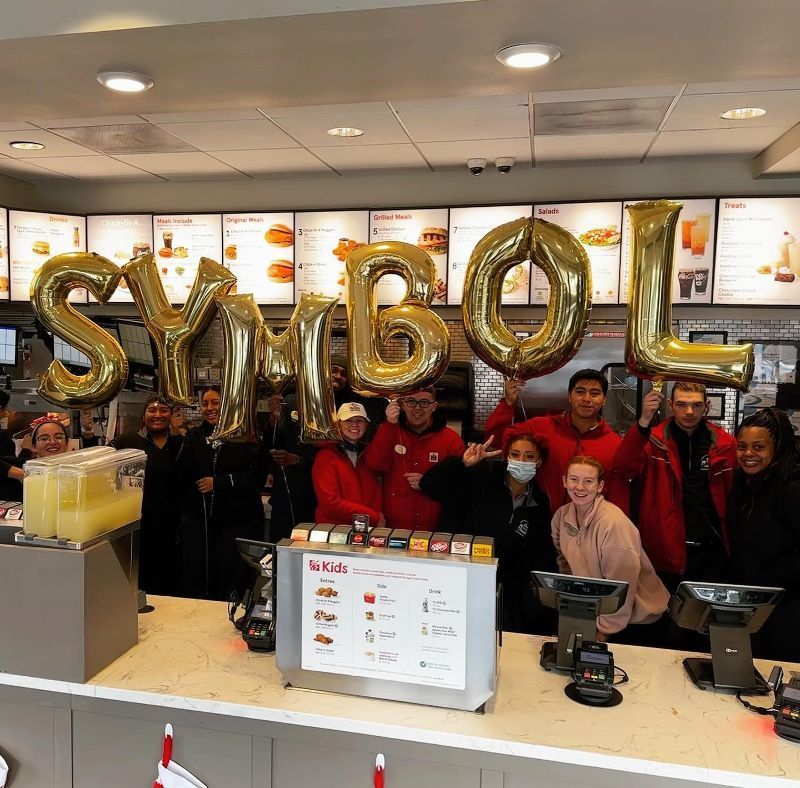 Chick-fil-A staff hold gold