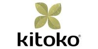 Logo for Kitoko, featuring a four-leaf clover symbol in light green above the word