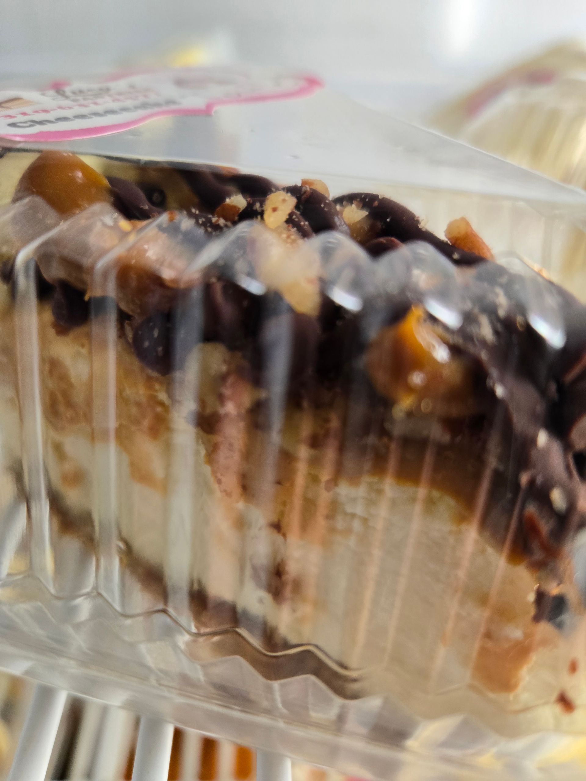 A close up of a piece of cake in a plastic container