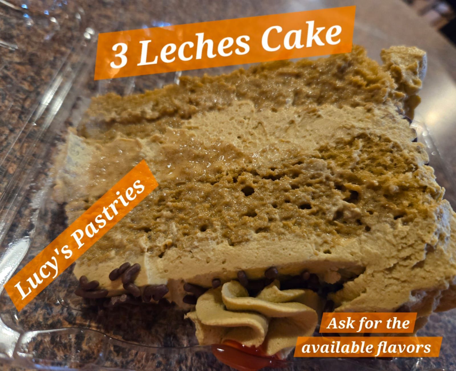 A slice of 3 leches cake in a plastic container