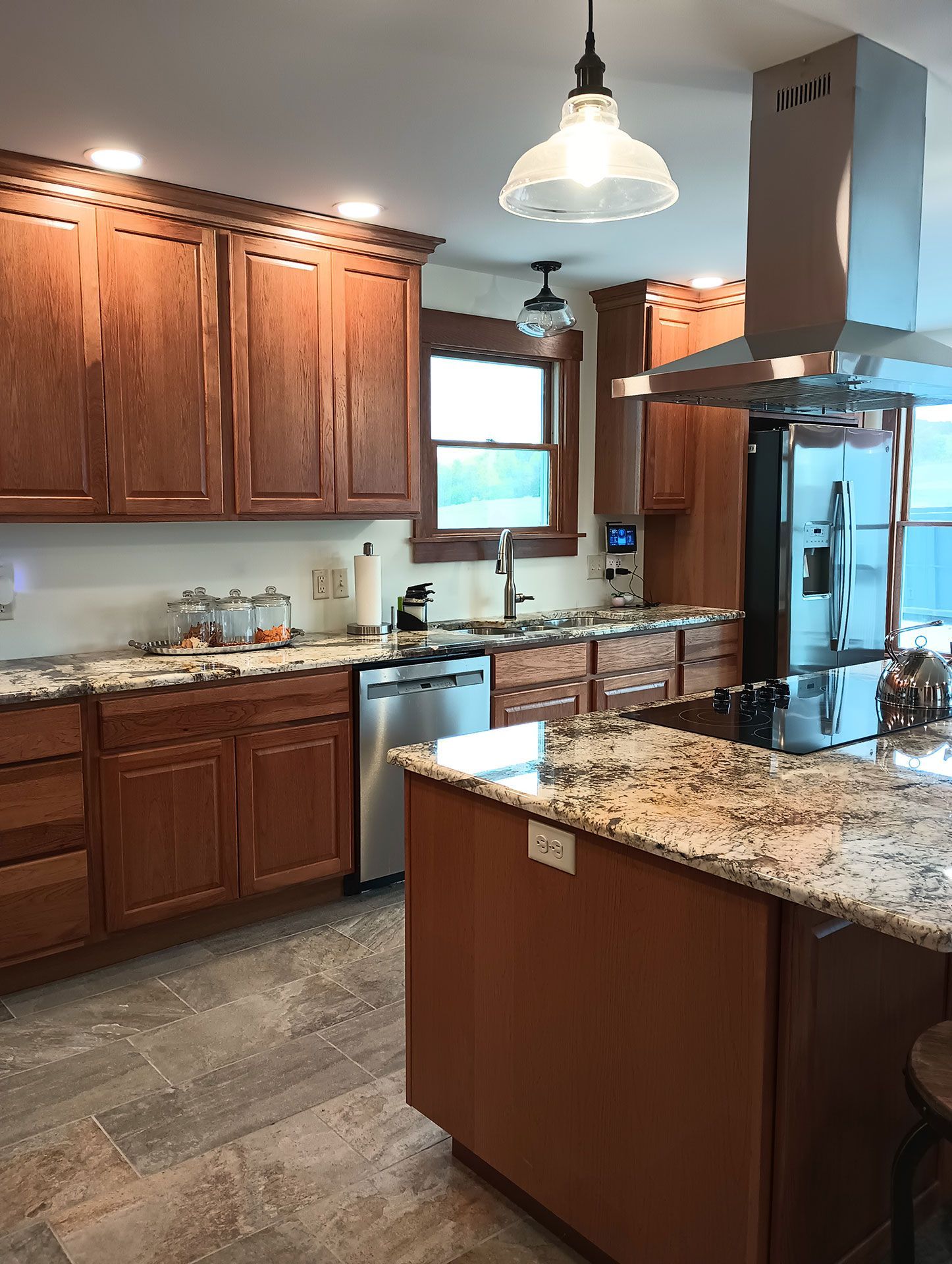 kitchen with wooden cabinets and granite counter tops