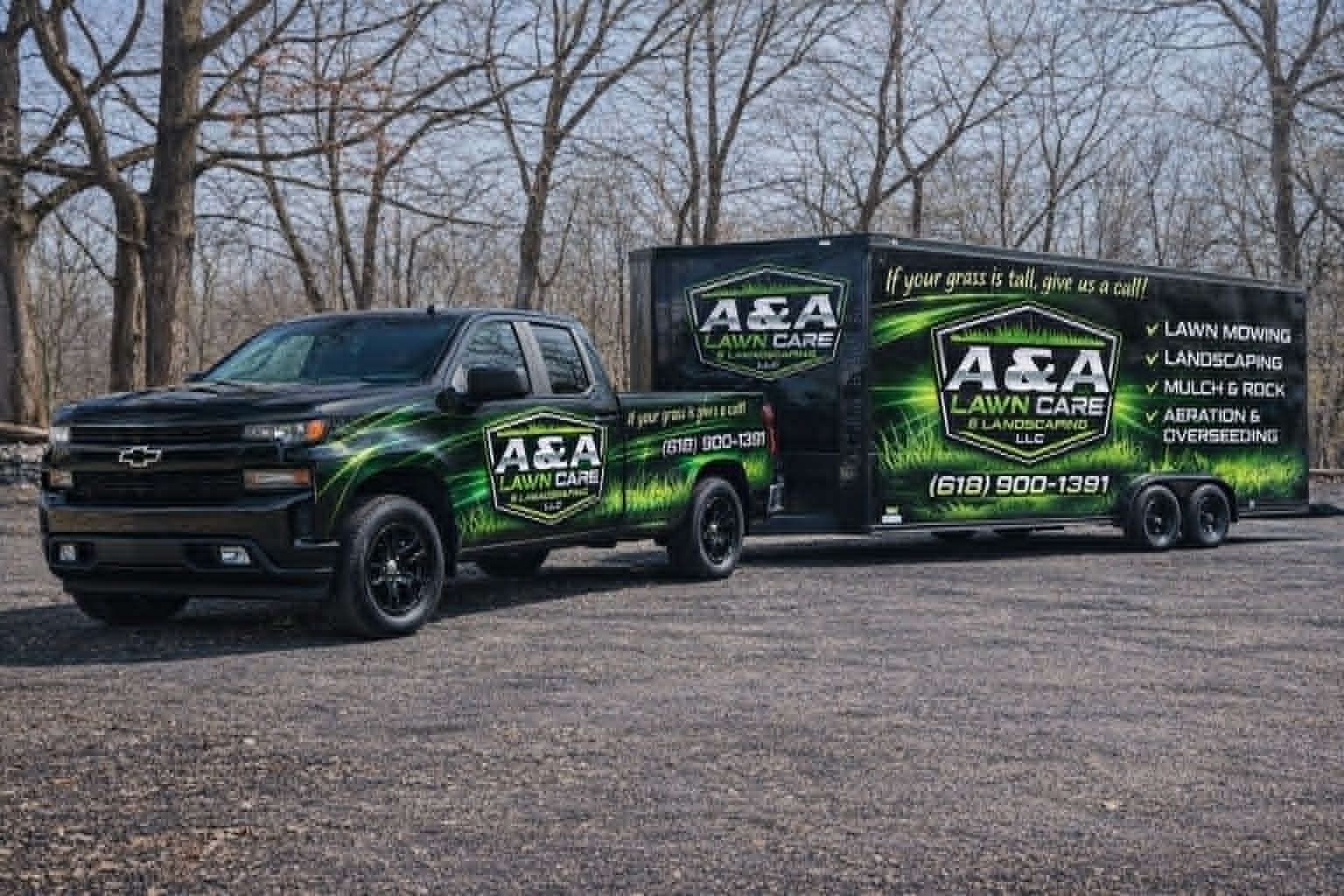 A black Chevrolet pickup truck towing a black A&A Lawn Care trailer parked on a gravel lot in front of trees.