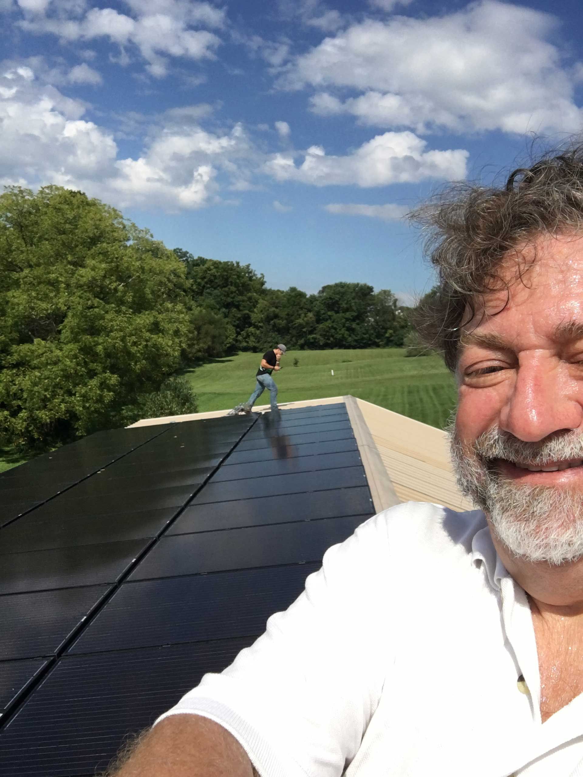 Perry installing solar panels
