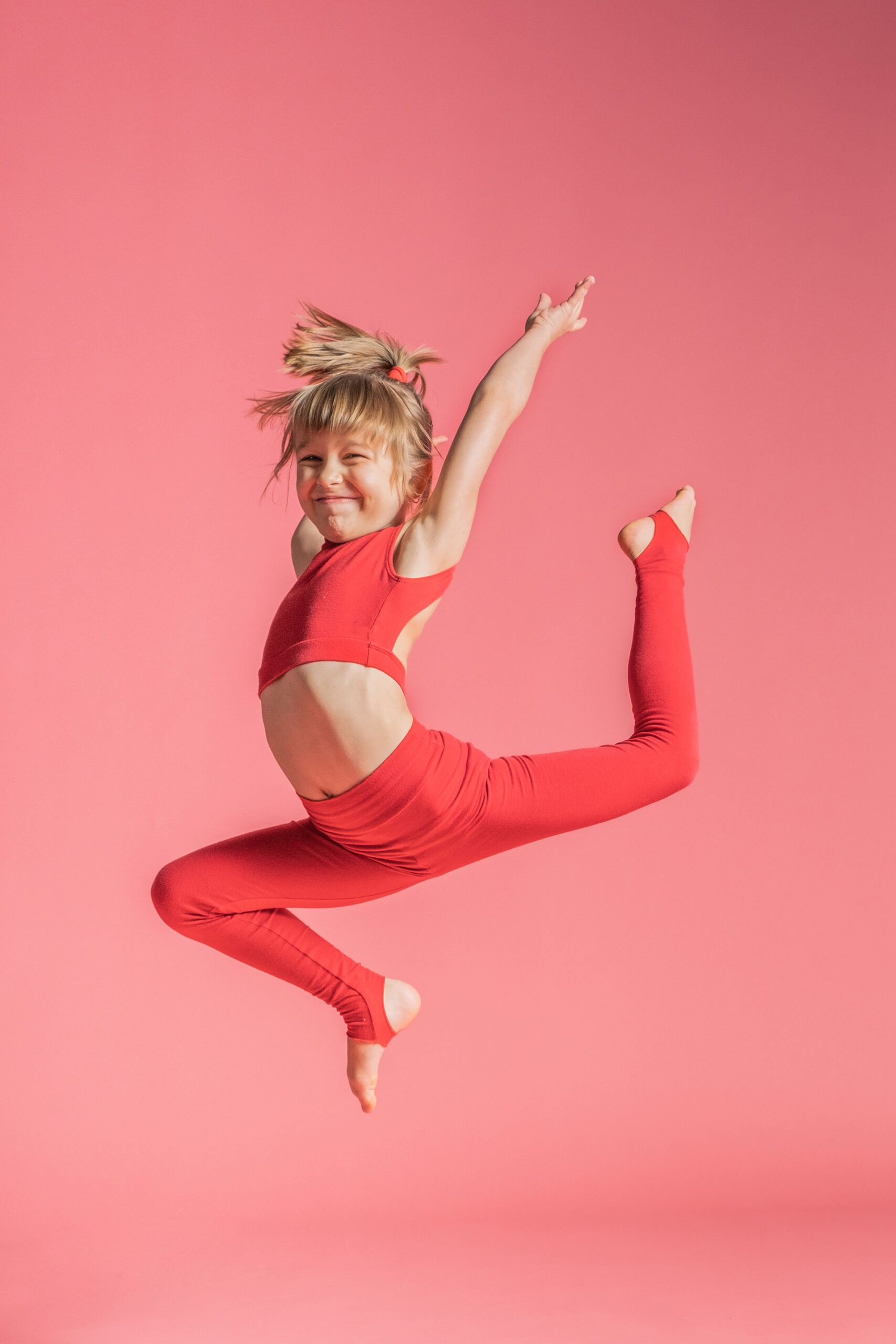 Little girl happily dancing