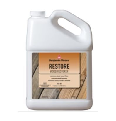 A bottle of restore wood restorer on a white background
