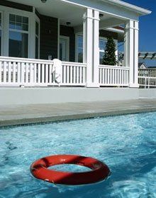 Red floater floating on pool