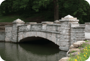 Stone bridge above the pond.