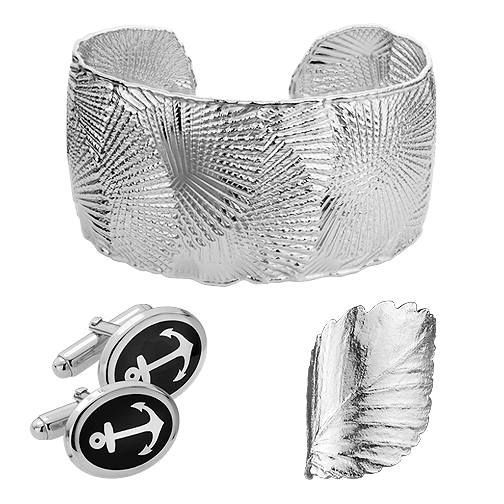 Silver textured cuff bracelet with anchor cufflinks and decorative leaf.