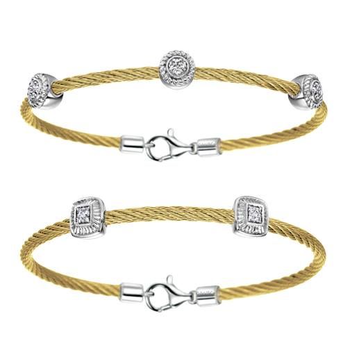 Two gold cable bracelets with silver accents and diamond-like embellishments.