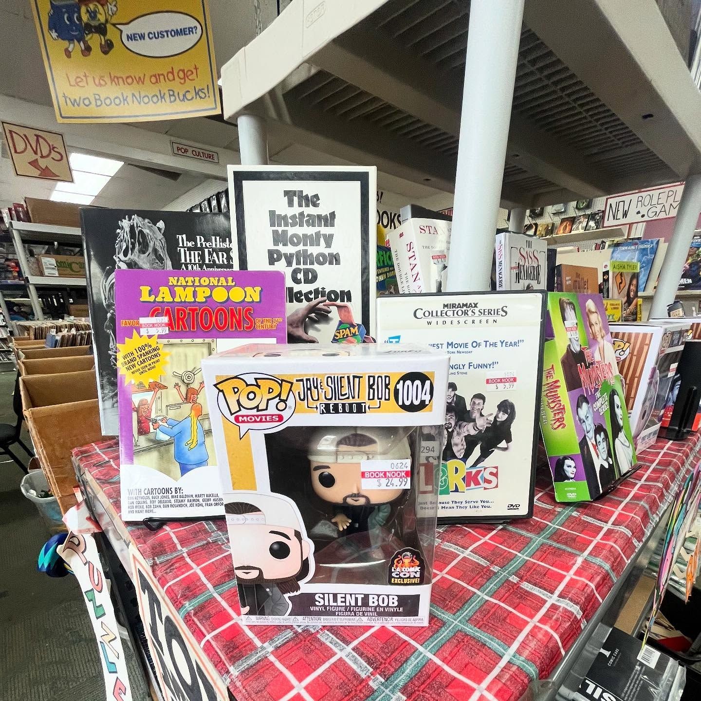 A table in a store with a funko pop on it