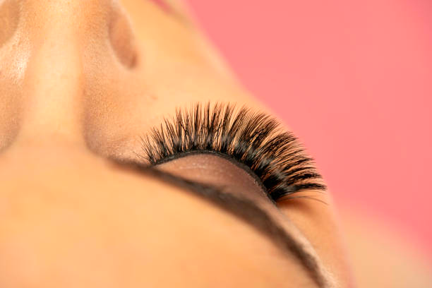 a stunning close-up of perfectly applied eyelash extensions