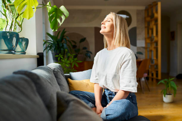 Person meditating for stress reduction and skin health Person meditating for stress reduction and skin health