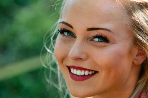 a happy client with beautiful eyelash extensions