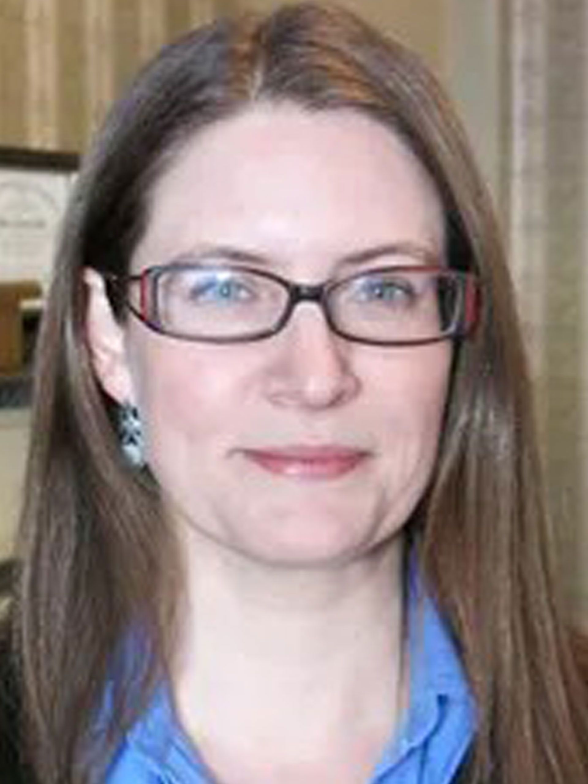 Photo of {{Team Member Name}}