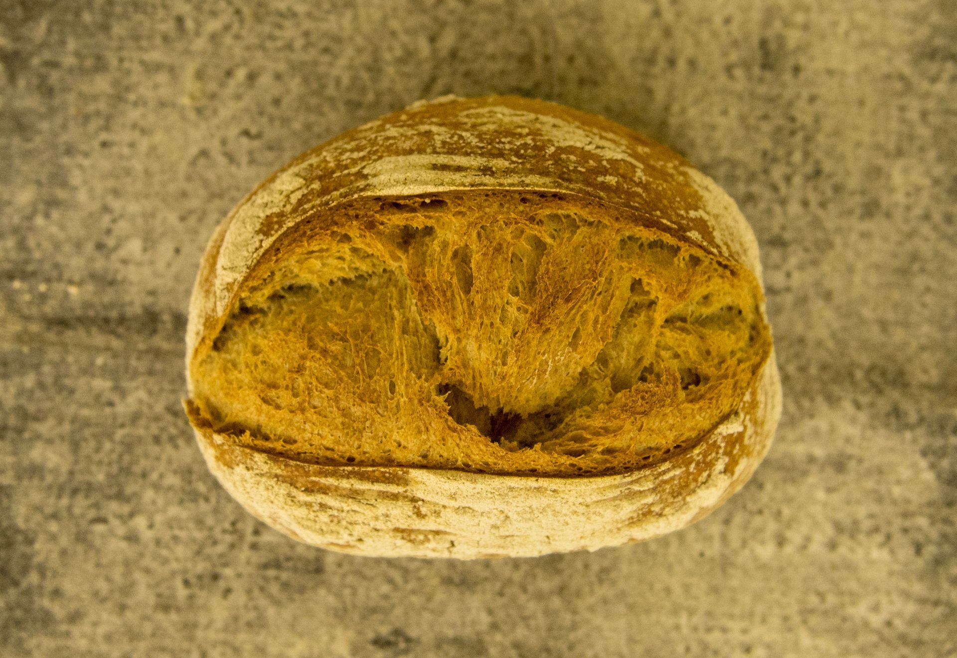A loaf of bread is sitting on a table.