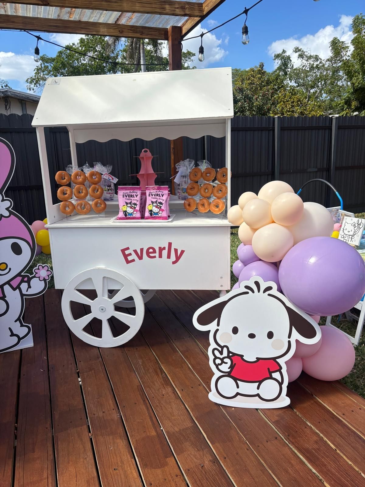 A white snack cart labeled 