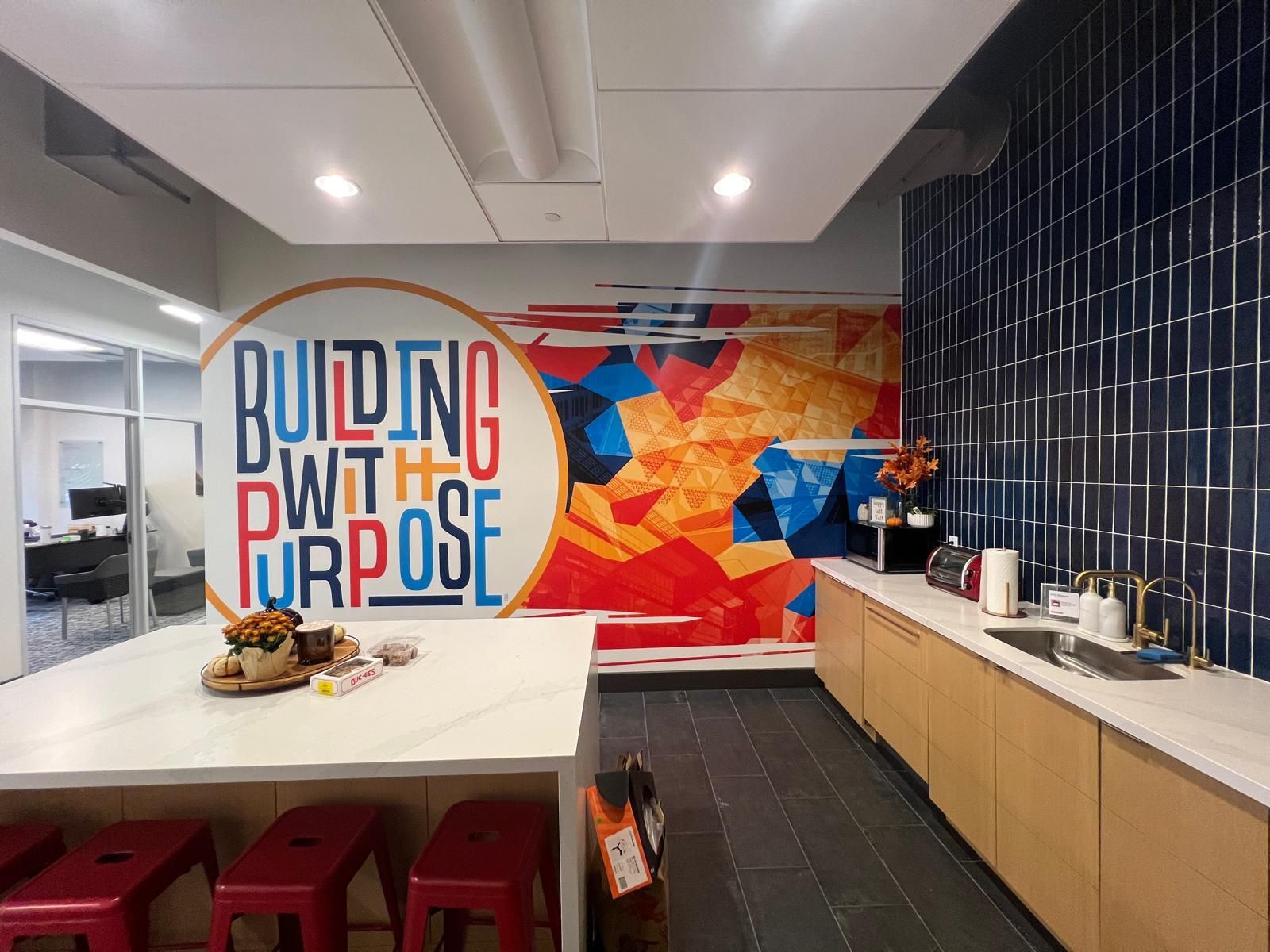 A modern breakroom with a large 