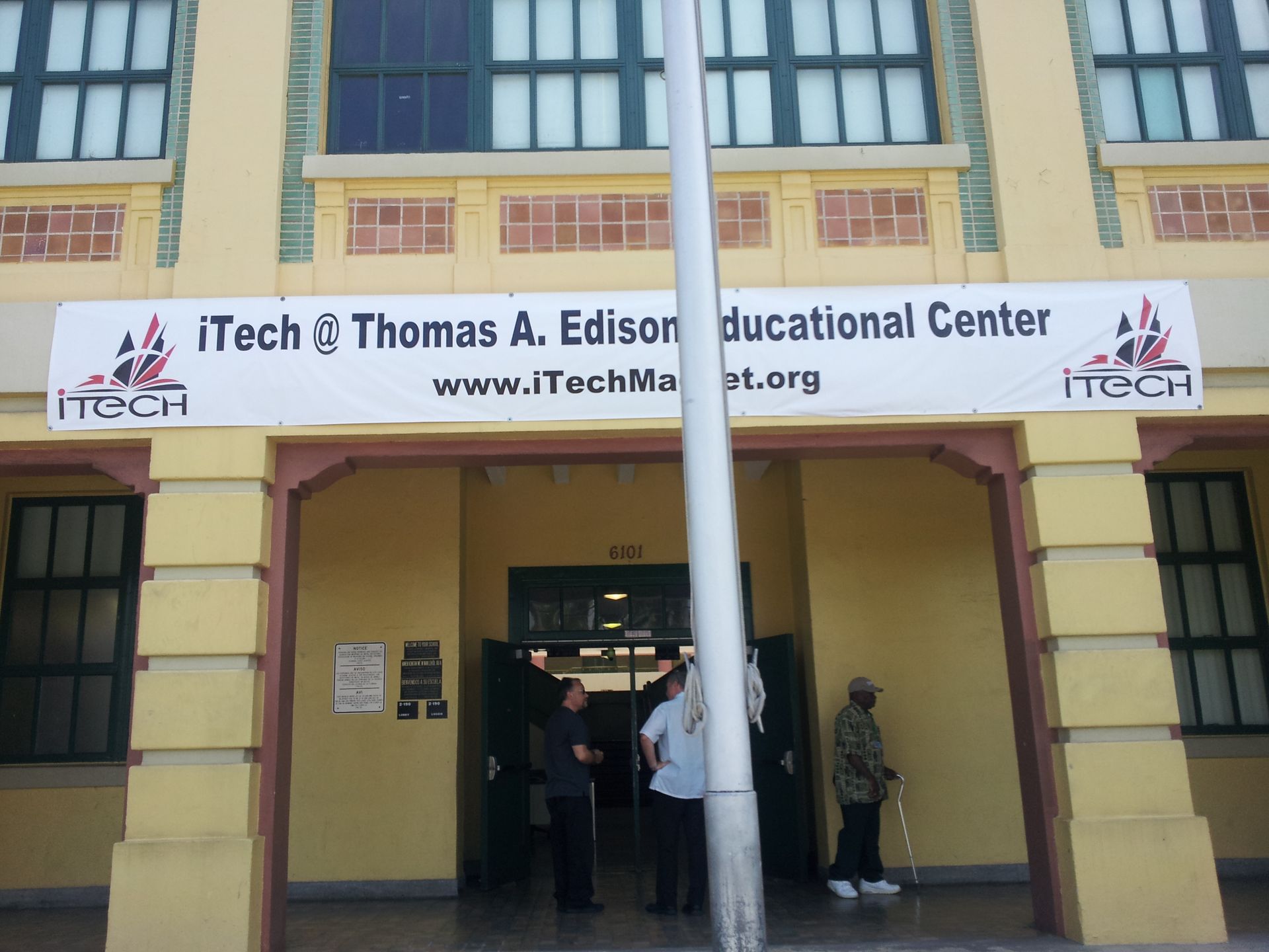Entrance to the iTech Thomas A. Edison Educational Center with a banner showing the website address above the door.