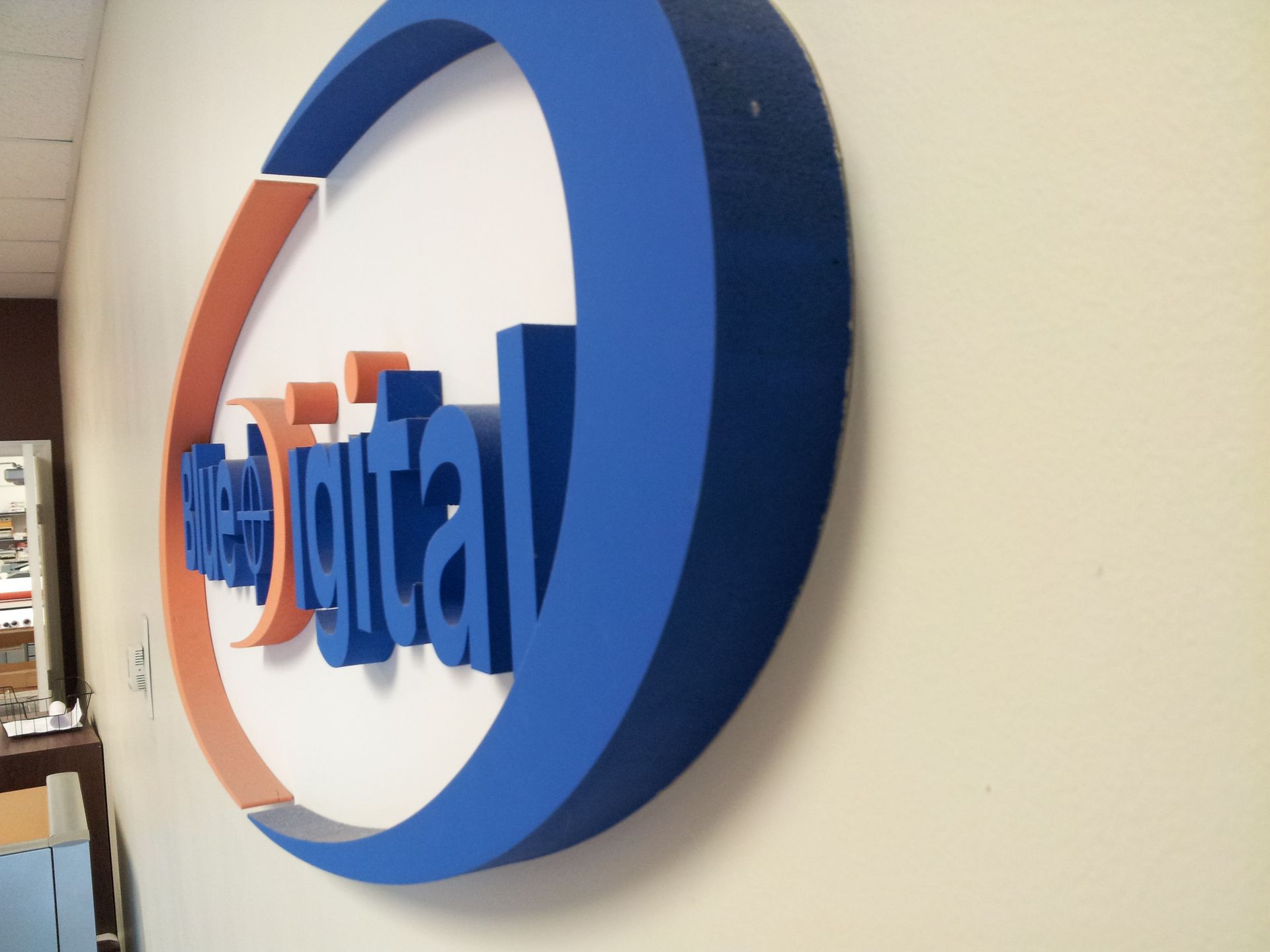 3D sign on a wall reading 