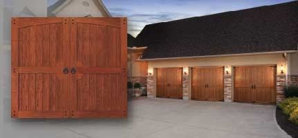 A picture of a wooden garage door next to a house.