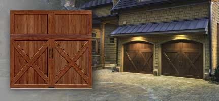 A wooden garage door is sitting in front of a house.