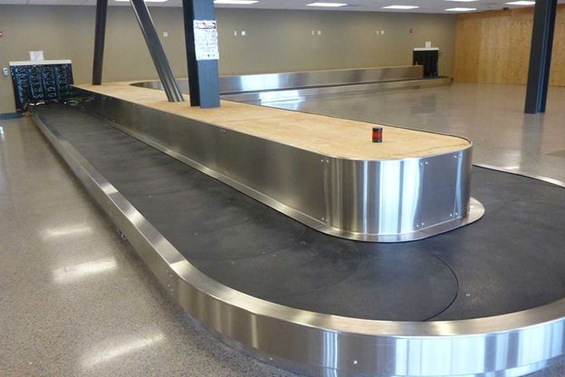 Curved and Machined Stainless Steel for Baggage Handling