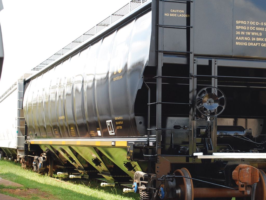 Formed heavy steel support hoops for Hopper Cars