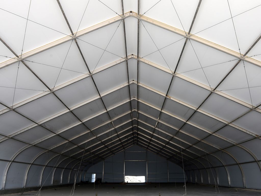 Curved, Machined, & Aged Heavy Extrusion for Clearspan Fabric Structures