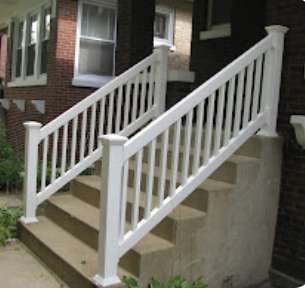 White railings on a set of stairs