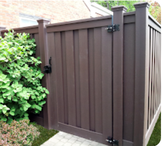 A brown fence with a gate