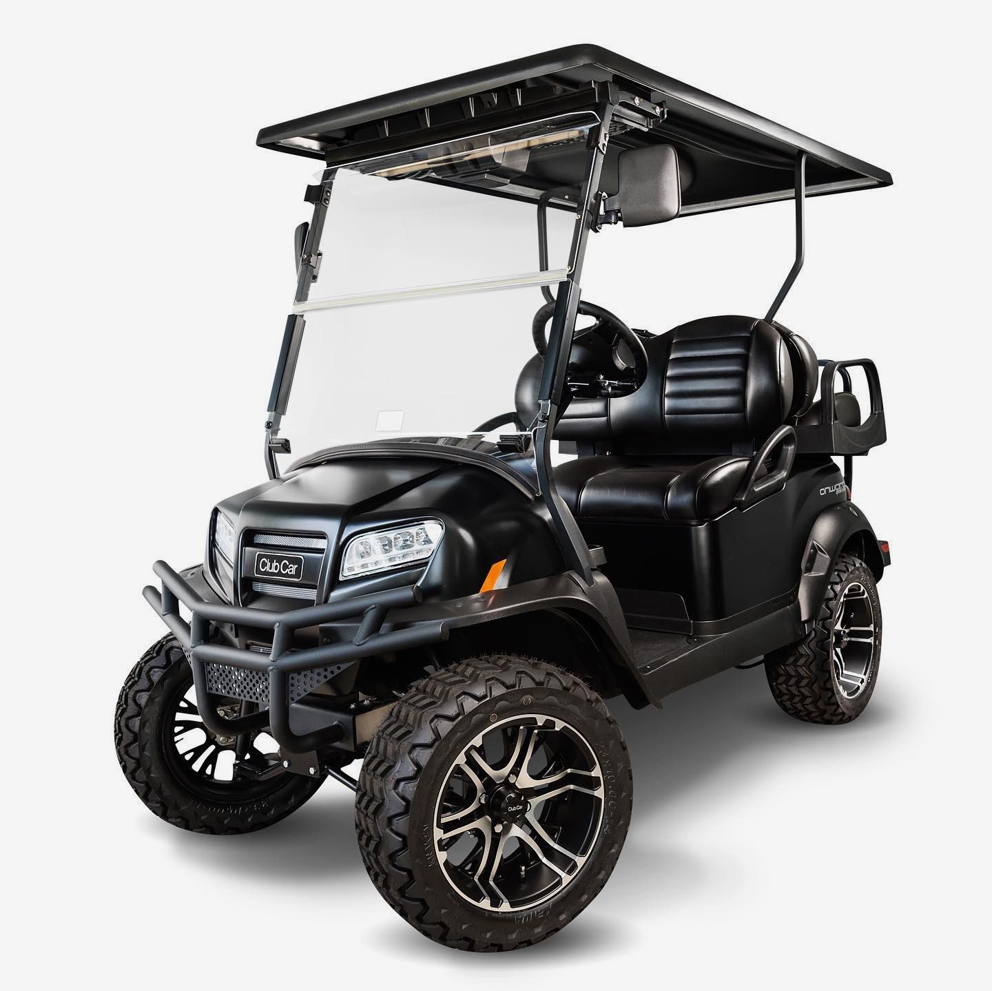 A black golf cart with a clear windshield on a white background.