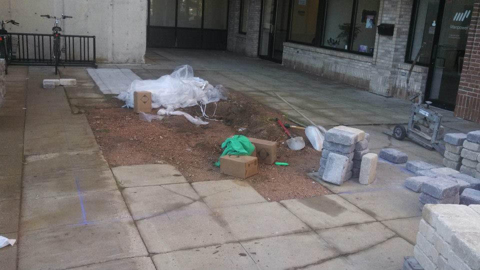 Another view of the cracked and busted concrete, as well as the planter area that displayed the large pots