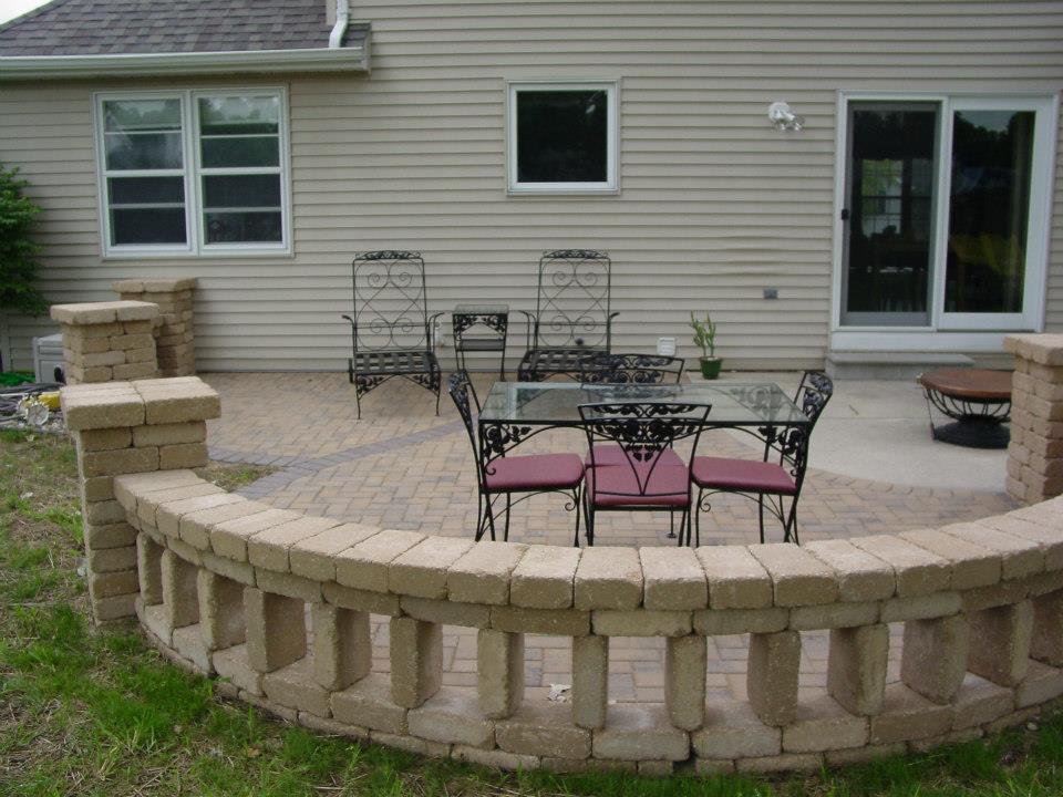 New patio area with walls and columns.